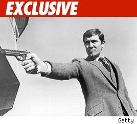 Former 007 Wants Money Galore from Wife