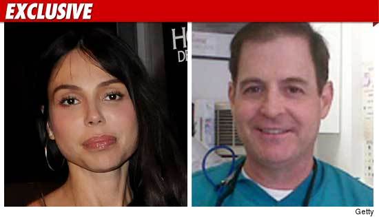 Oksana Grivorieva and Dentist Dr. Ross Sheldon