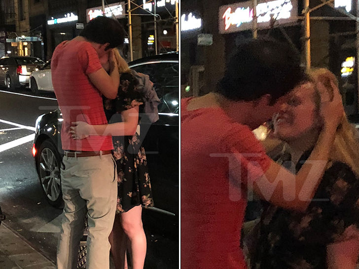 Elisabeth Moss Making Out with Mystery Man in NYC