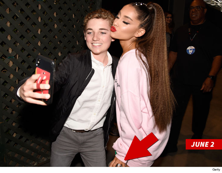 0612-ariana-grande-selfie-with-fan-getty