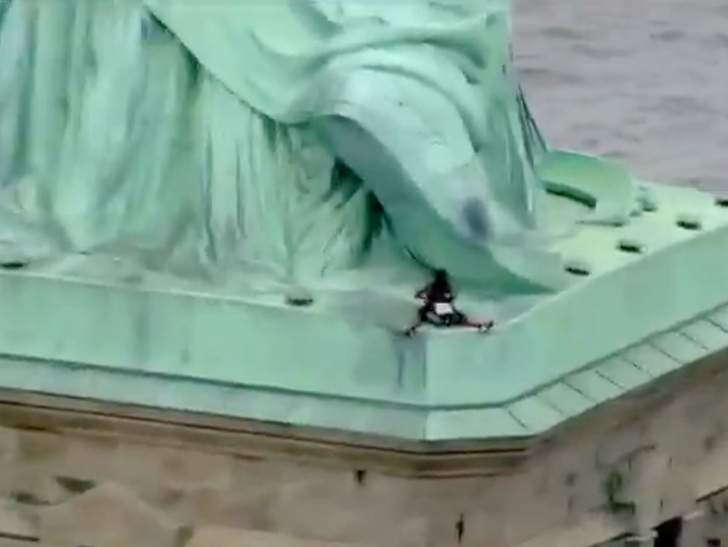 Statue of Liberty climber to be arraigned in federal court: paper Statue of Liberty climber to be arraigned in federal court: paper