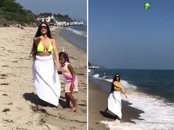 Kim Kardashian Strolls Malibu Beach in Bikini