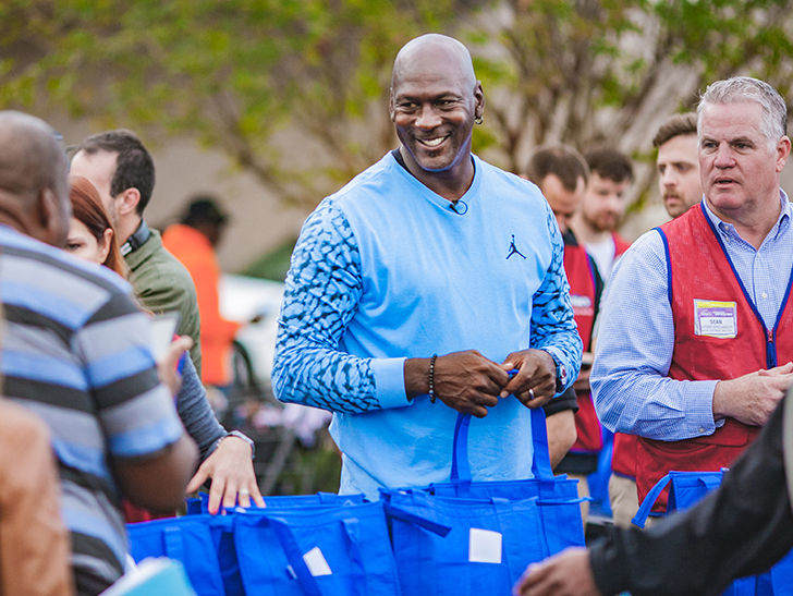 Michael Jordan Dishes Out Thanksgiving Meals to Hurricane Victims in